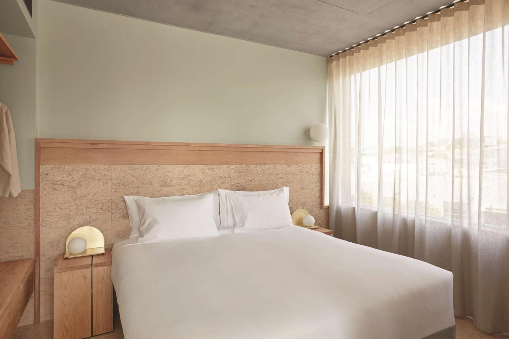 The Calile Hotel Brisbane Exterior foto A bedroom at the hotel